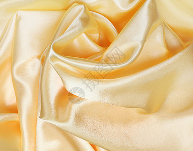 丝织布背景服装风格纺织品黄色棉布窗帘编织曲线材料丝绸背景图片