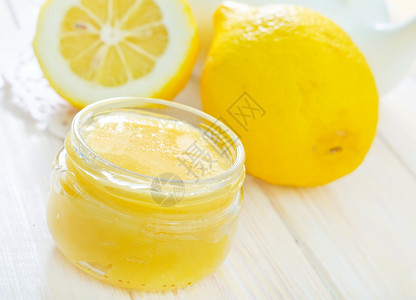 半透明柠檬蜂蜜和柠檬小麦水果玻璃食物青柠宏观木头产品蜂蜜营养背景