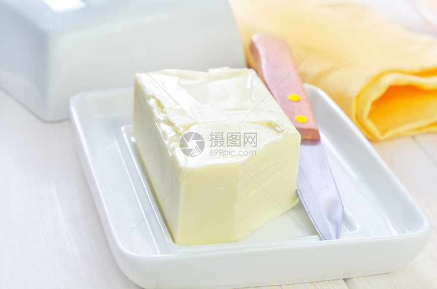 黄油持有者面团环境食品柔软度敷料橙子奶制品烹饪早餐图片