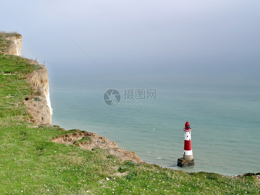 海滩头灯塔假期海岸风景地平线建筑海洋渠道岩石国家天空图片