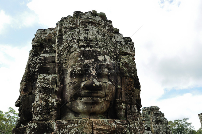 柬埔寨的Bayon寺庙艺术世界热带纪念碑地标上帝高棉语蓝色宽慰佛教徒图片