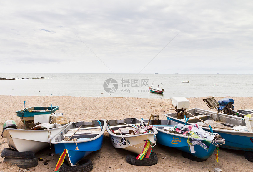 小型渔船石头地球港口钓鱼旅游渔夫海滩旅行场景假期图片