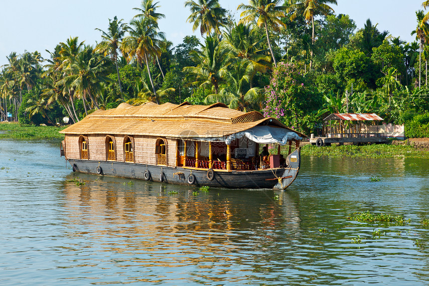 印度喀拉拉腊背水上的豪船棕榈船屋旅行风景热带运河闲暇血管日落旅游图片