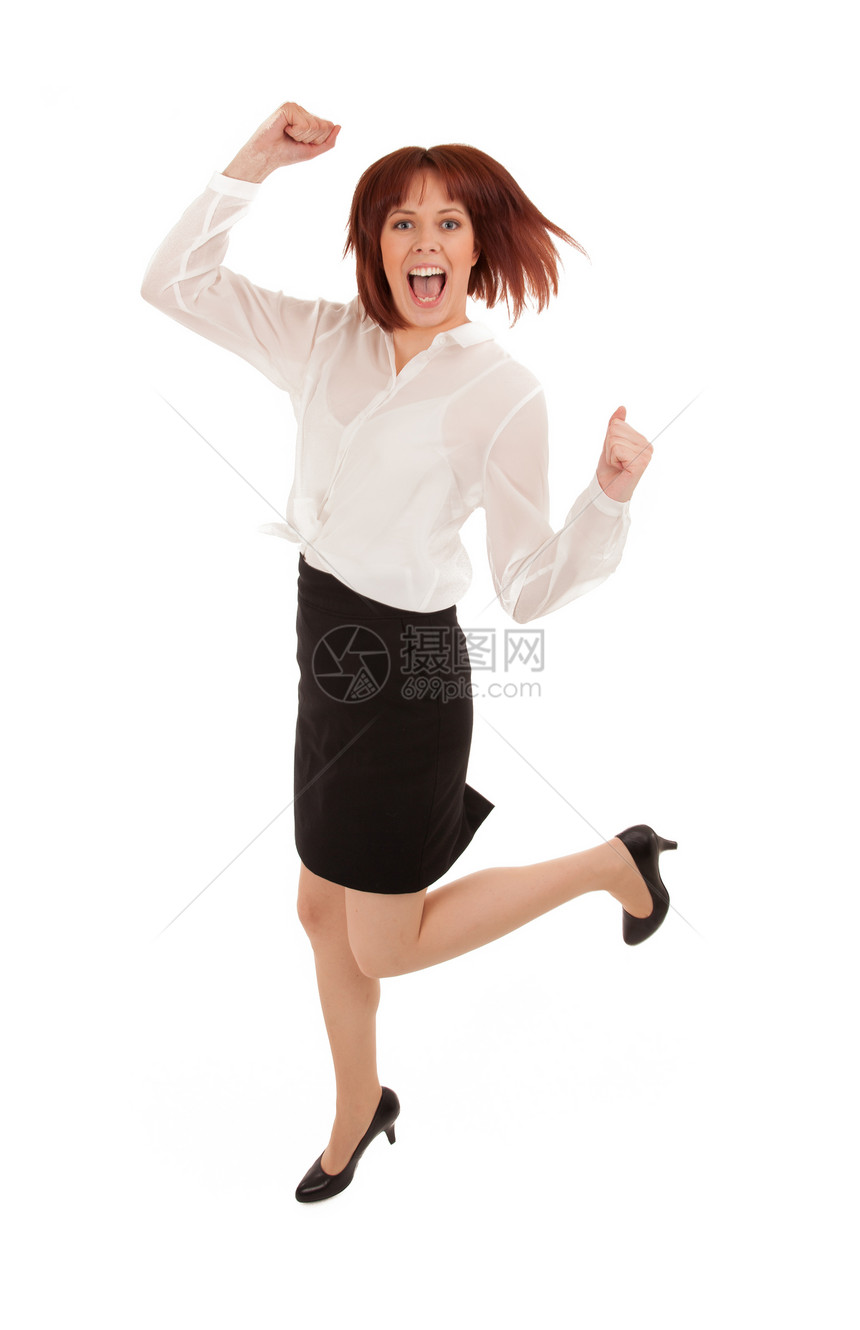兴奋的女人为欢乐而跳跃图片