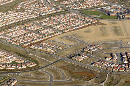 从空中开发住房发展路口承包商房屋开发商邻里街道天线家园学校背景图片