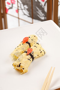 岩烧乳酪奥梅莱特 Maki 寿司樱花芝麻美味宏观鳗鱼食物玉子柚子筷子海鲜背景