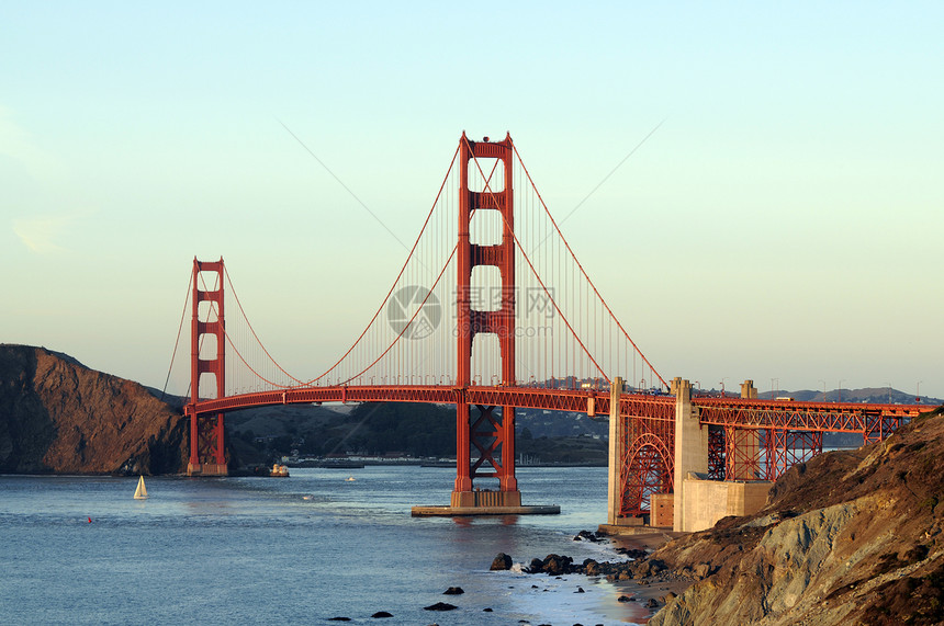 普雷西迪奥金门桥蓝色日落旅行旅游电缆海洋收费天空悬崖城市图片
