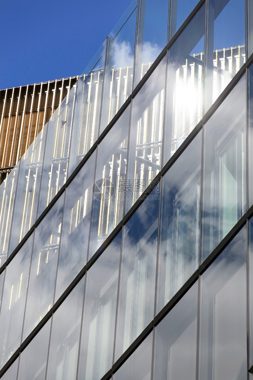 现代建筑财富市中心反射蓝色摩天大楼办公室城市技术玻璃建筑学图片