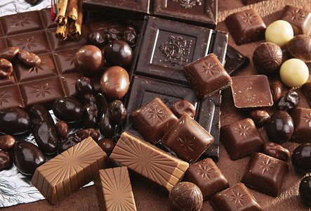 双色巧克力棒巧克力可可宴会糖果甜蜜肉桂棒甜品背景