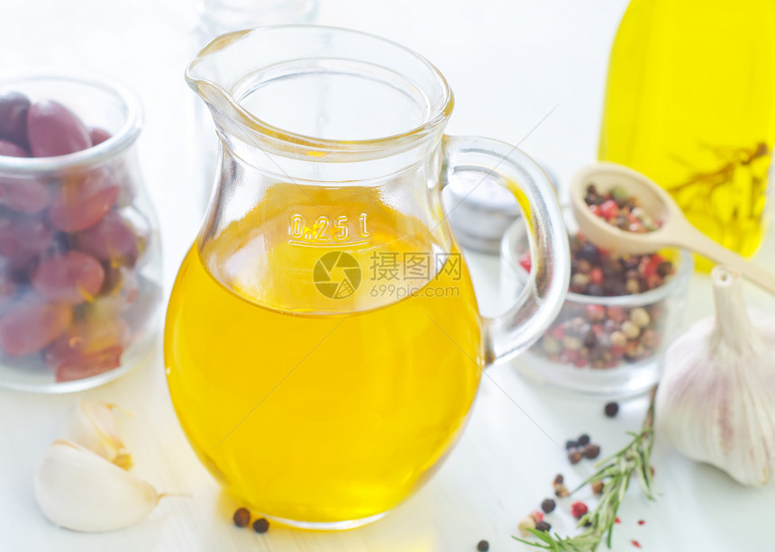 橄榄油液体瓶子静物金子水果生长餐厅花束木头香料图片