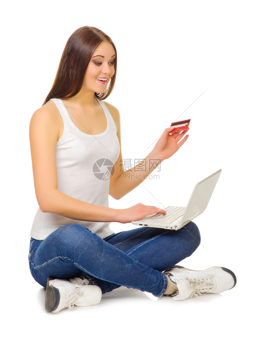 拥有笔记本电脑和信用卡的年轻女孩零售成人网络技术幸福商业支付享受互联网电子商务图片