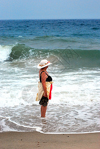 沙滩架女性成人闲暇海洋旅行假期女士背景图片