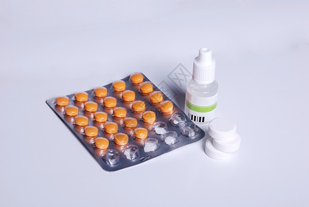 医疗的胶囊流感药片治疗摄影制剂疾病影棚瓶子维生素背景图片