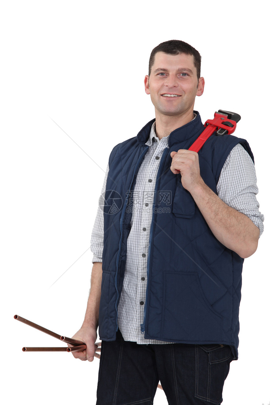 一个带扳手的水管工男性帽子电工工人安全木匠工作修理工建设者衣服图片