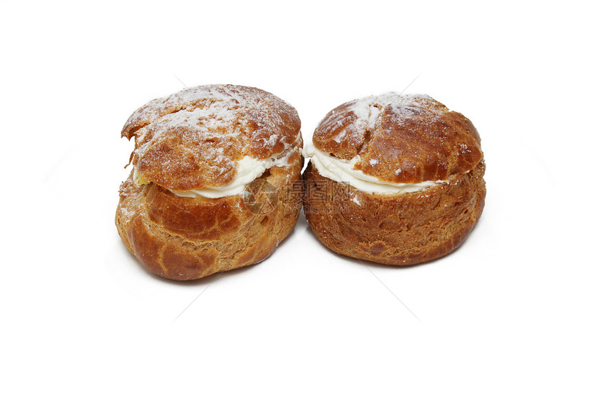 两个糕点食物棕色圆形奶油状奶油蛋糕小吃面包沙漠白色图片
