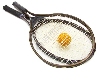 网球和白背景的电击运动球拍补给品黄色绿色白色背景图片