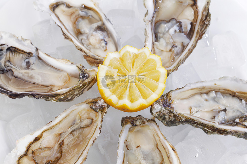 含柠檬的牡蛎盘子壳类营养美食食物贝类奢华餐厅饮食宏观图片