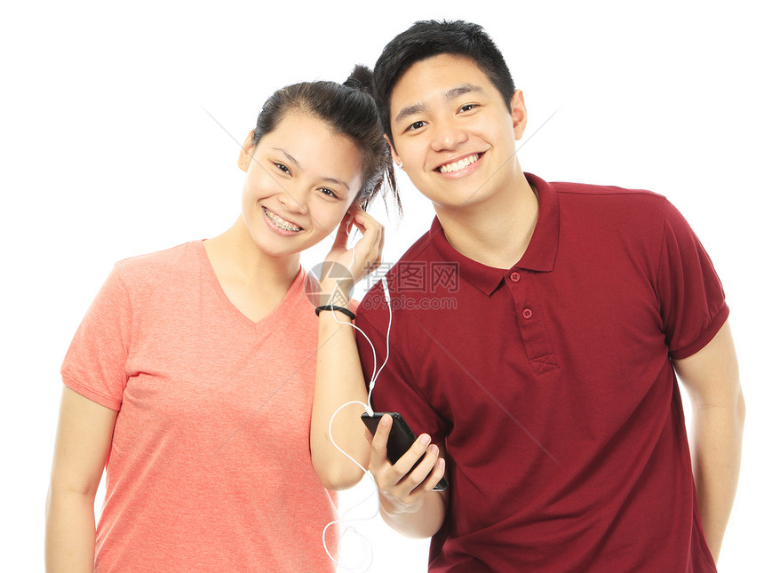 分享音乐音乐播放器青少年手机友谊年轻人男生耳机夫妻女性青年图片