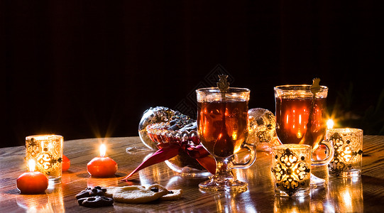 茶茶时间和自制饼干时候蜡烛照片反射温暖棕色火焰背景图片