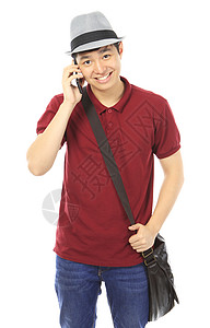 青少年呼唤大学生书包男生手机帽子休闲装青年技术电话男人背景图片