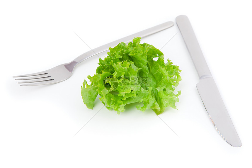 白底带刀和叉子的绿叶生菜图片