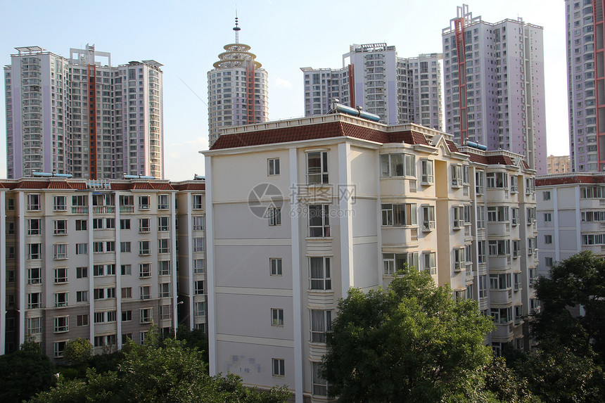 中国居民居住权之四绿色建筑物树木天空首都晴天公寓房子场景白色图片