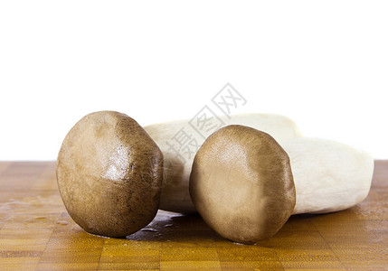 牡蛎王蘑菇砧板牡蛎棕色蔬菜食物国王植物高清图片