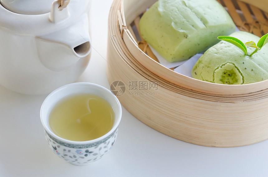 热茶和曼图馒头饺子盘子点心叶子油炸绿色美食食物小吃图片