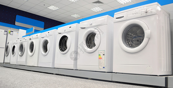 洗衣机洗衣店机器市场旋转洗涤剂背景图片