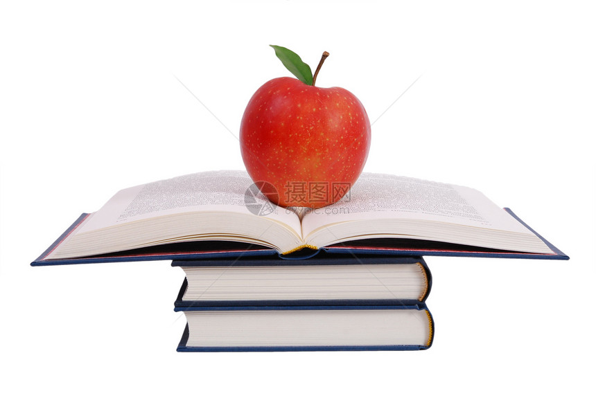 书塔 苹果在白色上被隔绝手册学士字典教育精装知识智慧页数桌子知识分子图片