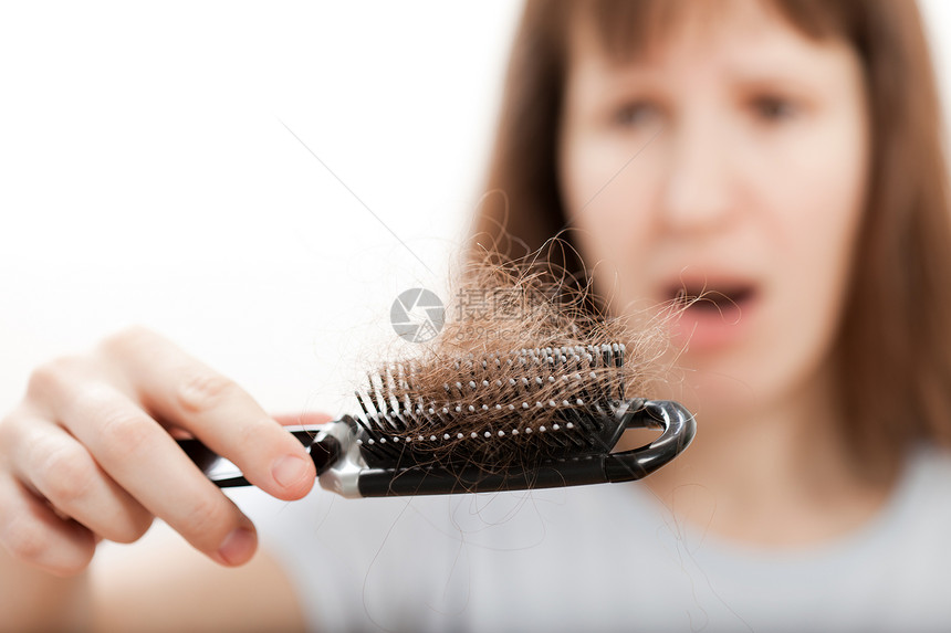 手握妇女头发梳子秃顶职业女性卫生保健损失药品工具女孩秃头图片