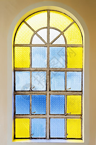 彩色玻璃窗口窗户结构蓝色黄色建筑学建筑对象棕色背景图片
