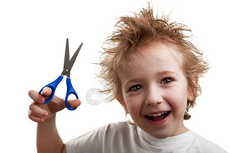 持有剪剪刀的儿童图片
