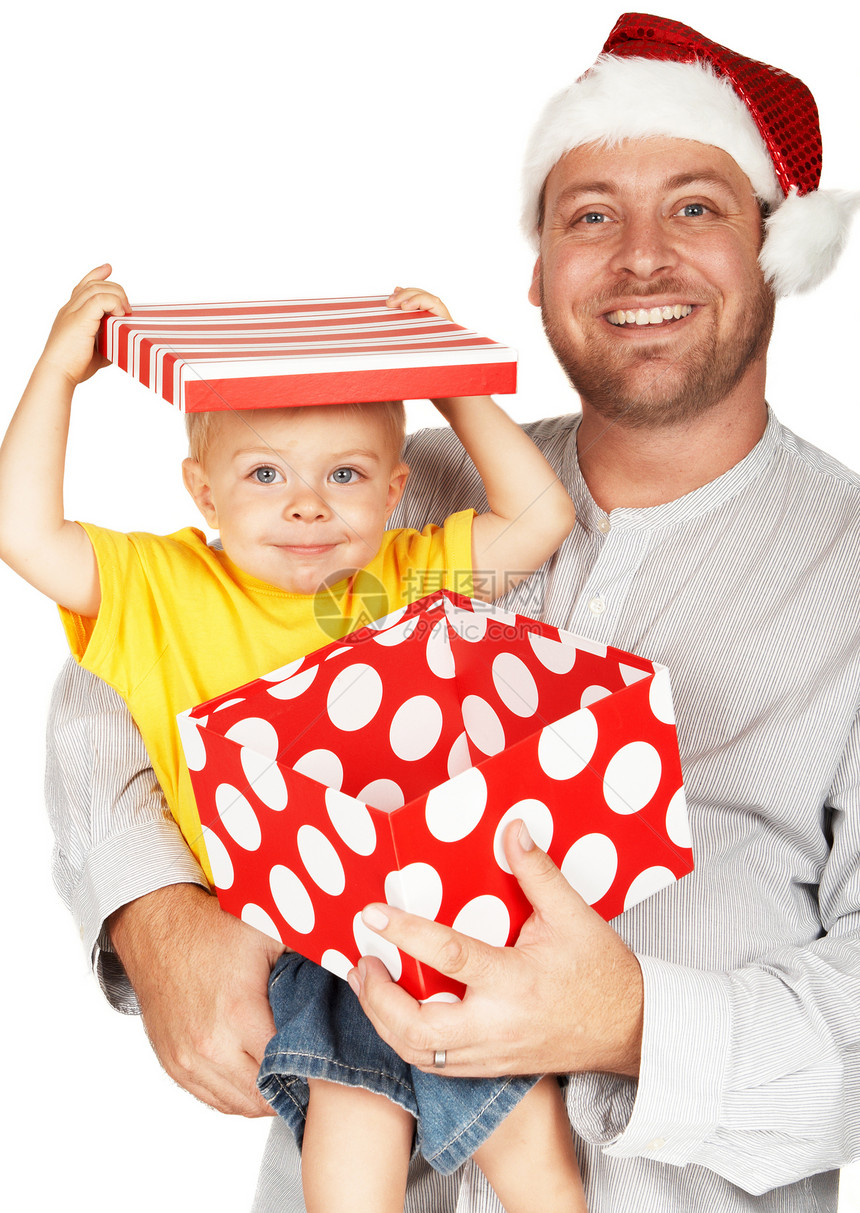 和父亲一起过圣诞的宝贝男孩男生爸爸头发蓝色男人微笑男性展示庆典礼物图片