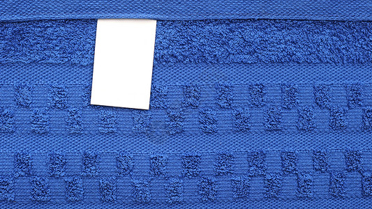 空白标签准则规格衬衫鉴别蓝色织物尺寸材料宏观衣服背景图片