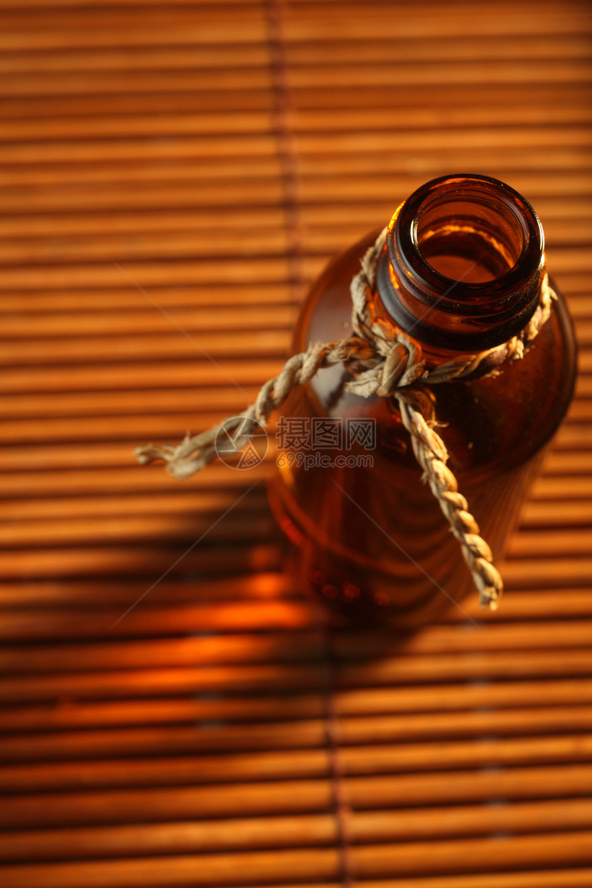 按摩油瓶瓶子背景护理棕色香薰香味身体摄影对象治疗图片
