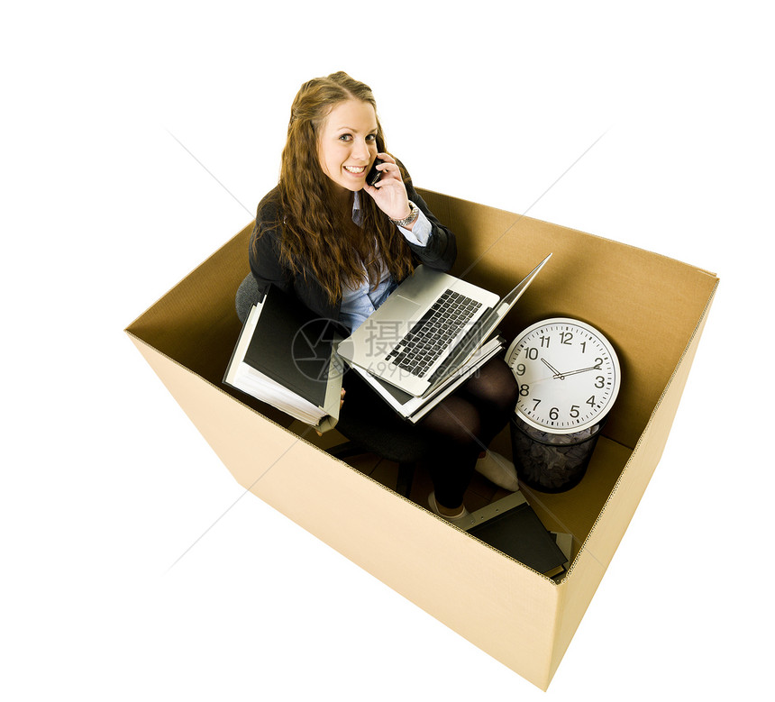 在一个小办公室里的女人纸盒商业工作头发棕色衬衫乐趣人士幸福蓝色图片