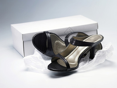 鞋鞋盒白色礼物女性鞋类黑色短剑背景图片