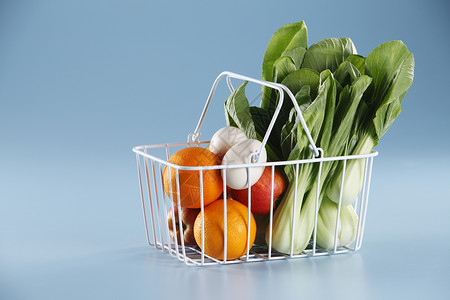 蔬菜橙子纯色绿色食物背景白色金属背景图片