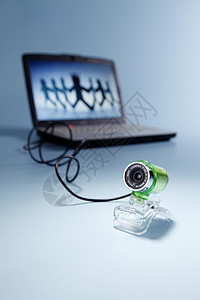 网络相机镜片展示对象白色摄像头电脑技术纯色绿色背景图片
