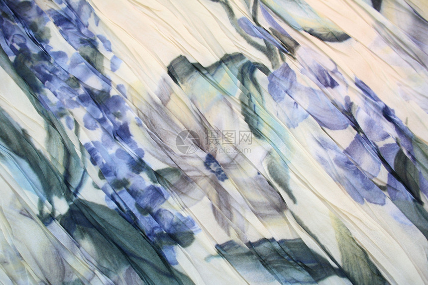 蓝花在回春织物上的水彩色形态图片
