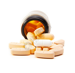 塑料罐中药丸的超视光     孤立制药塑料药品白色圆形治疗药物药片背景图片