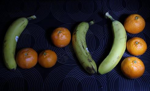 果实爱橙子黄色亲热香蕉感情甜点橘子浪漫食物背景图片