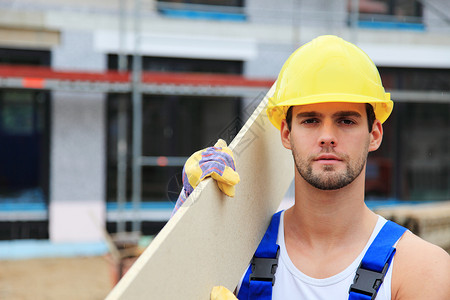 手工工人木板建筑业工匠石匠体力劳动者工地监工脚手架白色男性白色的高清图片素材