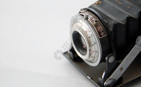 模拟数字照相机电影光学古董金属技术风格合金相机时间照片背景图片