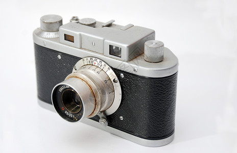 模拟数字照相机复古皮革相机工作室古董风格金属电影照片镜片背景图片