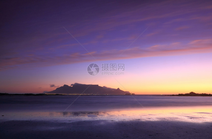 南非海滩的表观南非海滩日落天空反思桌景风景城市奇观海洋灯光太阳旅行图片