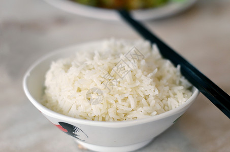 蒸米饭用具棕色营养粮食文化餐厅餐具黑色食物筷子背景图片