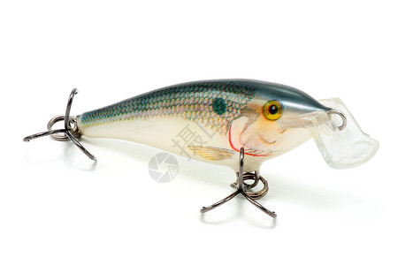 带钩子的人工鱼模仿漂浮绿色红色钓鱼白色黑色背景图片
