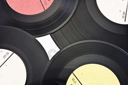 旧灰尘破旧的乙烯胶唱片黑色技术旋律曲线光盘尘土划痕标签塑料舞蹈背景图片